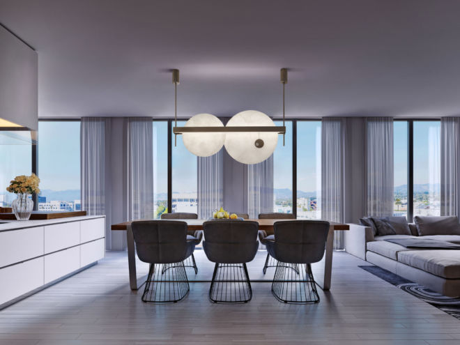 Contemporary dining room with large table and loft style chairs.